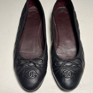 CHANEL Black Quilted Loafers with Bow